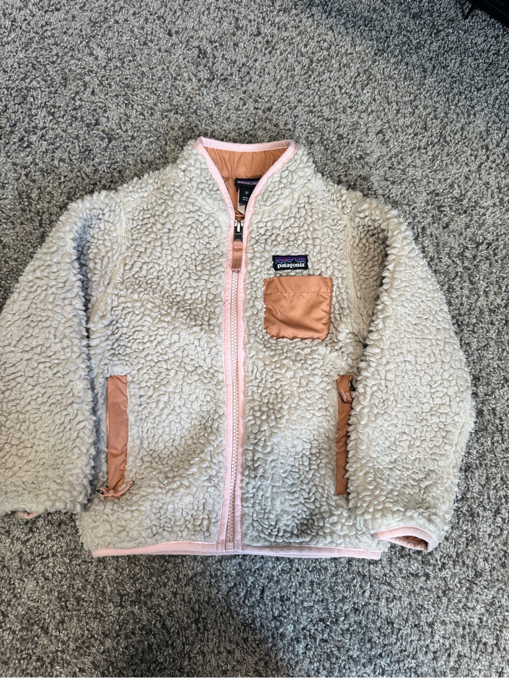Patagonia Cream Sherpa Jacket with Pink Trim and Peach Accents